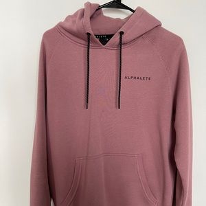 Men’s Pink Alphalete hoodie, Size Medium. Rubber stamp logo.